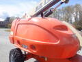 A 2008 JLG Boom Lift with a bright orange exterior and the model number 400S prominently displayed on its side