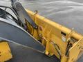 2011 John Deere 310SJ 4x4 Wheel Loader Extended Hoe 4 in 1 with a yellow body and black arm visible in the foreground