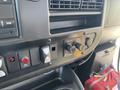 Interior control panel of a 2017 Chevrolet Express featuring buttons for various functions and ports for rear air conditioning