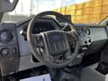 Interior view of a 2011 Ford F-450 SD showing the steering wheel and dashboard with controls and displays