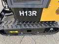 Close-up of a yellow AGT Industrial H13R Mini Excavator showing its track and identification number on the side