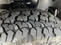 Close-up of a tire tread from a 2019 Mercedes-Benz Sprinter showing detailed patterns designed for traction and durability