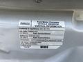 A label from a 2021 Ford Transit displaying vehicle emission control information and specifications including fuel type and compliance details