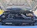 Engine compartment of a 2016 Ford F-550 showing the engine components and various mechanical parts