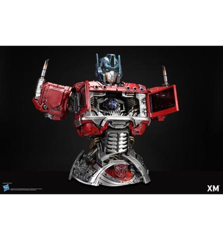 Transformers Premium Collectible Series Optimus Prime 1/3 Scale Limited Edition Bust features a detailed robotic figure with blue and red metallic accents and silver mechanical elements