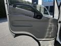 The image shows the interior door panel of a 2020 Hino 195 with a textured gray surface and a door handle near the top