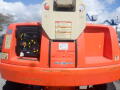 Front view of a 2008 JLG Boom Lift showing control panel and orange exterior with visible company logo