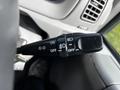 A control lever from a 2004 Toyota Toyoace with settings for headlights and fog lights showing the ON and OFF positions