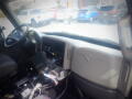 Interior view of a 2016 International WorkStar 7500 truck showing the dashboard and controls with a focus on the driver's seat and central console