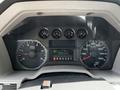 Dashboard of a 2009 Ford F-550 displaying gauges for RPM speed and trip information with indicators for gear selection