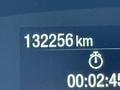 A digital display showing the odometer reading of a 2022 Ford Transit at 132256 km with a stopwatch timing function below