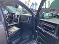 A 2017 RAM 1500 interior view showcasing the driver's side with leather seats and modern dashboard features