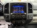 Dashboard of a 2020 Ford F-550 featuring a touchscreen display with controls for media navigation and phone connectivity