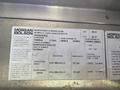 A vehicle specifications plate for a 2007 Morgan Olson Workhorse W42 detailing vehicle weight dimensions and manufacturing information