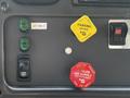 Dashboard controls of a 2004 Freightliner M2 featuring buttons for parking brake air supply and mirror heat with indicator lights