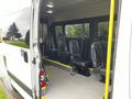 Interior of a 2016 RAM Promaster with multiple seating options visible including removable seats arranged for accessibility