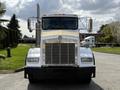A 1996 Kenworth T800 truck facing forward with a prominent grille chrome accents and a large front bumper