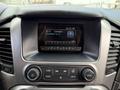 Dashboard of a 2017 Chevrolet Tahoe featuring a touchscreen display and controls for radio and media