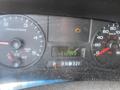 A 2007 Ford F-350 SD dashboard with speedometer and tachometer displays showing various readings including speed fuel and engine status