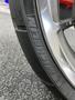 Close-up of a Michelin tire mounted on a 2024 Harley Davidson Fat Boy motorcycle showcasing the tread and brand logo