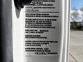 2016 Isuzu NQR vehicle emission control information label displaying VIN and compliance details for heavy-duty vehicles