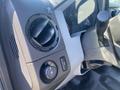 Interior view of a 2016 Ford F-350 SD showing the dashboard with air vents and controls including an off-road toggle switch and a gear shift lever