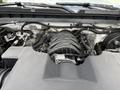 Engine compartment of a 2017 Chevrolet Silverado 1500 showcasing the engine and surrounding components