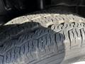 Close-up of a tire from a 2017 Ford Transit highlighting the tread pattern and texture