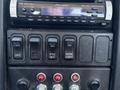 Dashboard controls of a 2008 International DuraStar featuring a Pioneer stereo and various switches for lock differential PTO and work light