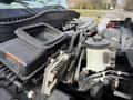 Close-up view of the engine compartment of a 2014 International TerraStar showing various engine components and hoses