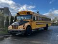 2005 Blue Bird 48 passenger school bus with yellow body and large front windshield