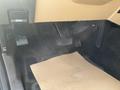 Interior of a 2014 Ford F-350 SD showing the floor area with pedals and a floor mat