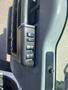 Interior control panel of a 2016 Ford F-350 SD featuring switches for windows and locks