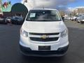 A white 2015 Chevrolet City Express van is shown from the front with a Chevrolet logo on the grille and no license plate displayed