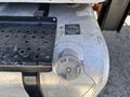 Diesel fuel tank cap and gauge on a 2019 Ford F-750 with a step plate above it