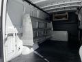 A 2020 Mercedes-Benz Sprinter van interior featuring two metal shelves mounted along one side