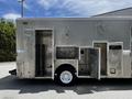 A 2008 Morgan Olson Workhorse truck with a silver metallic exterior featuring multiple doors and a single white wheel on the driver's side