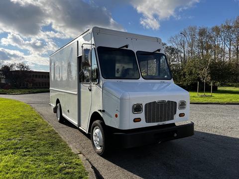 A 2017 Freightliner M Line truck with a boxy shape and a white exterior featuring large windows and a simple front grille