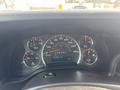 Dashboard of a 2018 Chevrolet Express showing speedometer odometer fuel gauge and engine temperature gauge