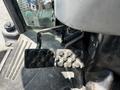 Foot pedals of a 2018 New Holland Boomer 45 tractor showing a textured surface for grip and control