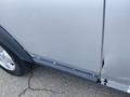 2006 Land Rover LR3 with a silver exterior showing wear and slight scratches on the body along the side door and running board