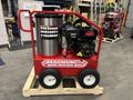 A red 2024 Magnum 4000 Hot Water Pressure Washer with a stainless steel tank and a black engine on a wooden pallet