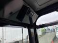 Interior view of a 2024 AGT Industrial Yellow H13R Mini Excavator showing controls and cabin features