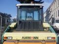 Front view of a 2012 Ammann AV130X compactor with a large flat surface and visible logo on the rear section