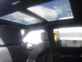 Interior view of a 2022 Ford F-150 showing the front seats and a panoramic sunroof above