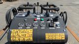 Control panel of a 2024 Agt Ktt23 Stand On Skid Steer Track Loader featuring various switches gauges and safety warning indicators