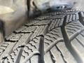 Close-up of a tire tread showing deep grooves and patterns designed for traction on a 2017 Acura TLX
