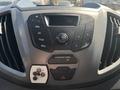 Control panel of a 2016 Ford Transit featuring buttons for radio, sound, and airbag indicator