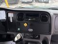 Dashboard of a 2015 Freightliner M2 106 featuring air vents a radio and various control buttons