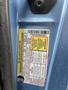 Label on a blue 2006 Ford Econoline displaying vehicle specifications and safety information
